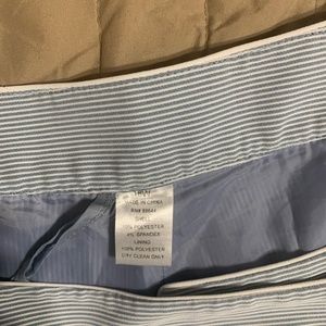 Class is blue and white striped suit